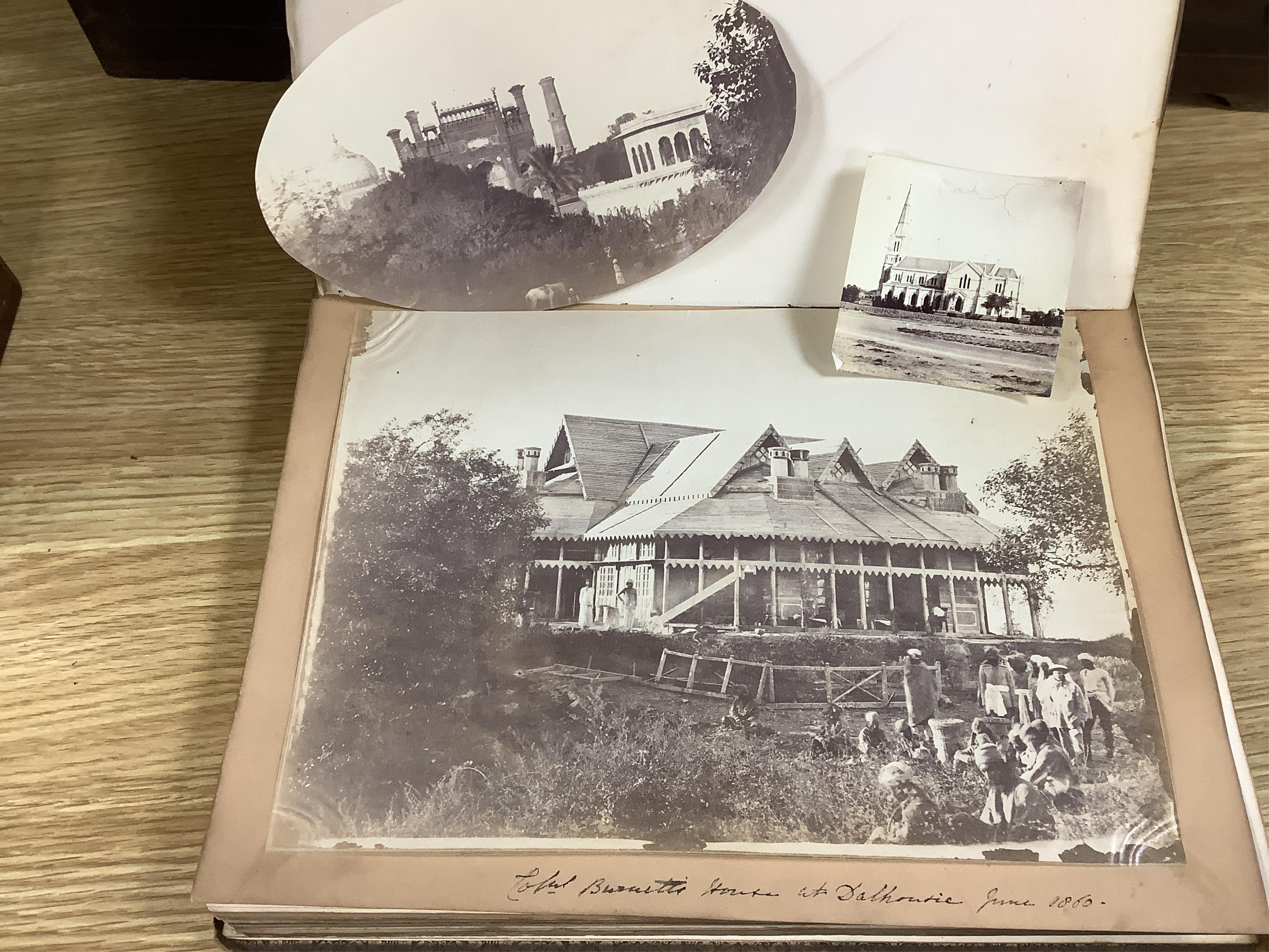 A Victorian photograph album; assorted portraits (many named) and views of India, many dated c.1860's. Condition - album spine torn, contents fair